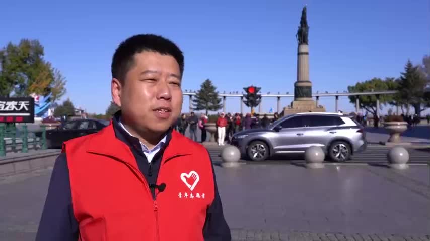 倒计时100天｜“志愿红”扮靓城市迎亚冬