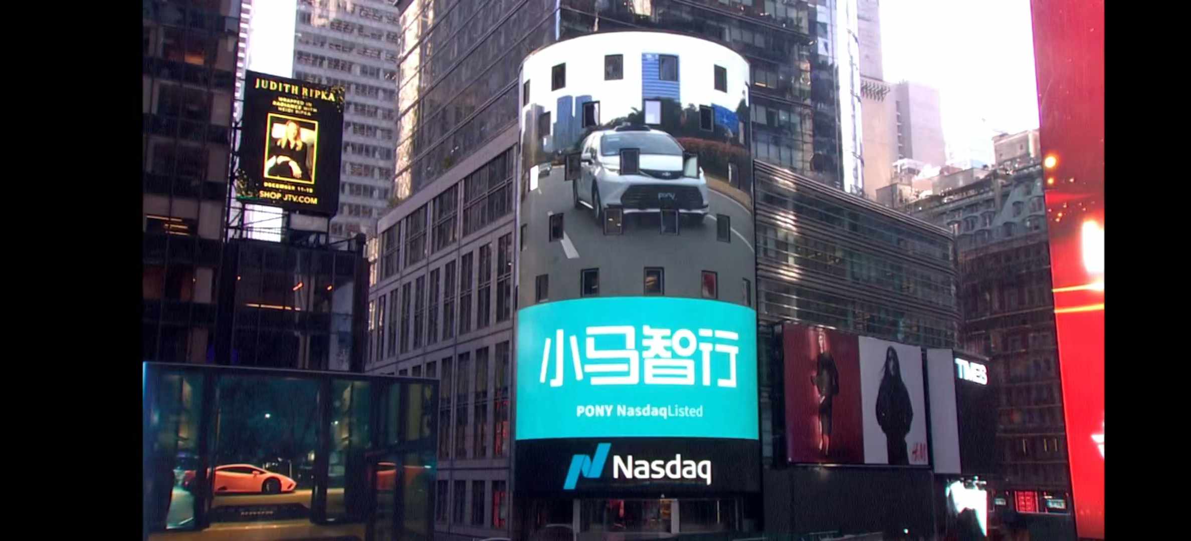 小马智行在美国纳斯达克敲钟上市，为全球Robotaxi第一股