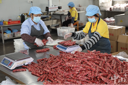 黄圃腊味飘香年味浓，企业鼓足干劲忙产销｜新春走基层