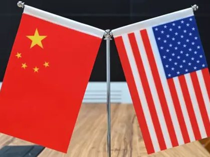 何立峰会见美国前财政部长保尔森