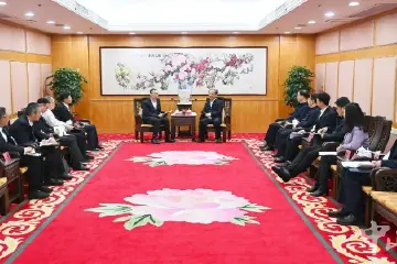 郭文海会见广东电网公司董事长、党委书记杨松楠一行