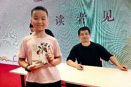 迷上荔枝文化，中山9岁少年书展“追星”马伯庸