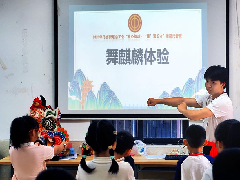 凝聚高校智慧!马峦街道江岭社区传承发展舞麒麟文化