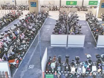 晶报特别报道 | 科技赋能+规则引领，龙华破题百万电单车“围城”