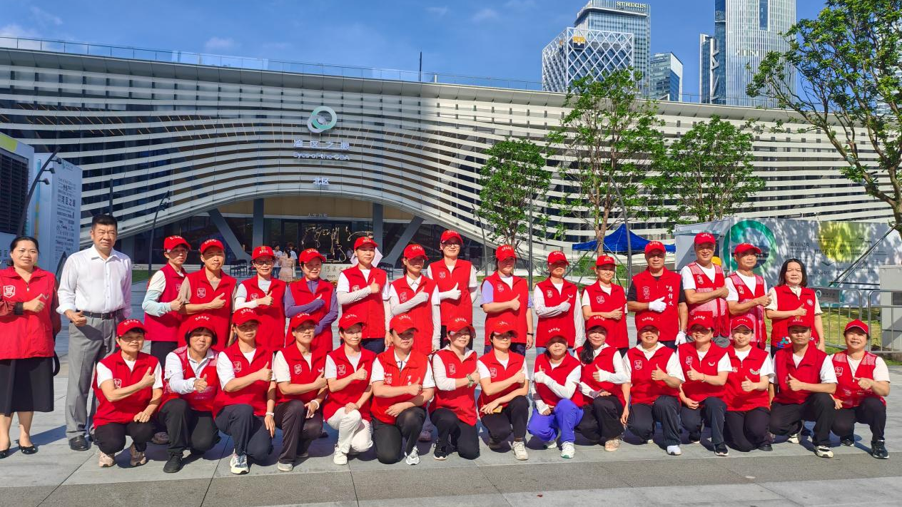 新安海滨社区文明引导志愿服务,助力“湾区之眼”开业