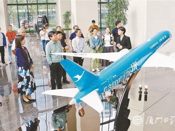 探寻城市发展的活力密码 “总编辑看厦门”活动昨走进厦门航空总部和鼓浪屿，了解发展与传承如何双向奔赴