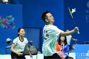 夫妻档父子兵!十五运会羽毛球群众赛场见证“合家欢”