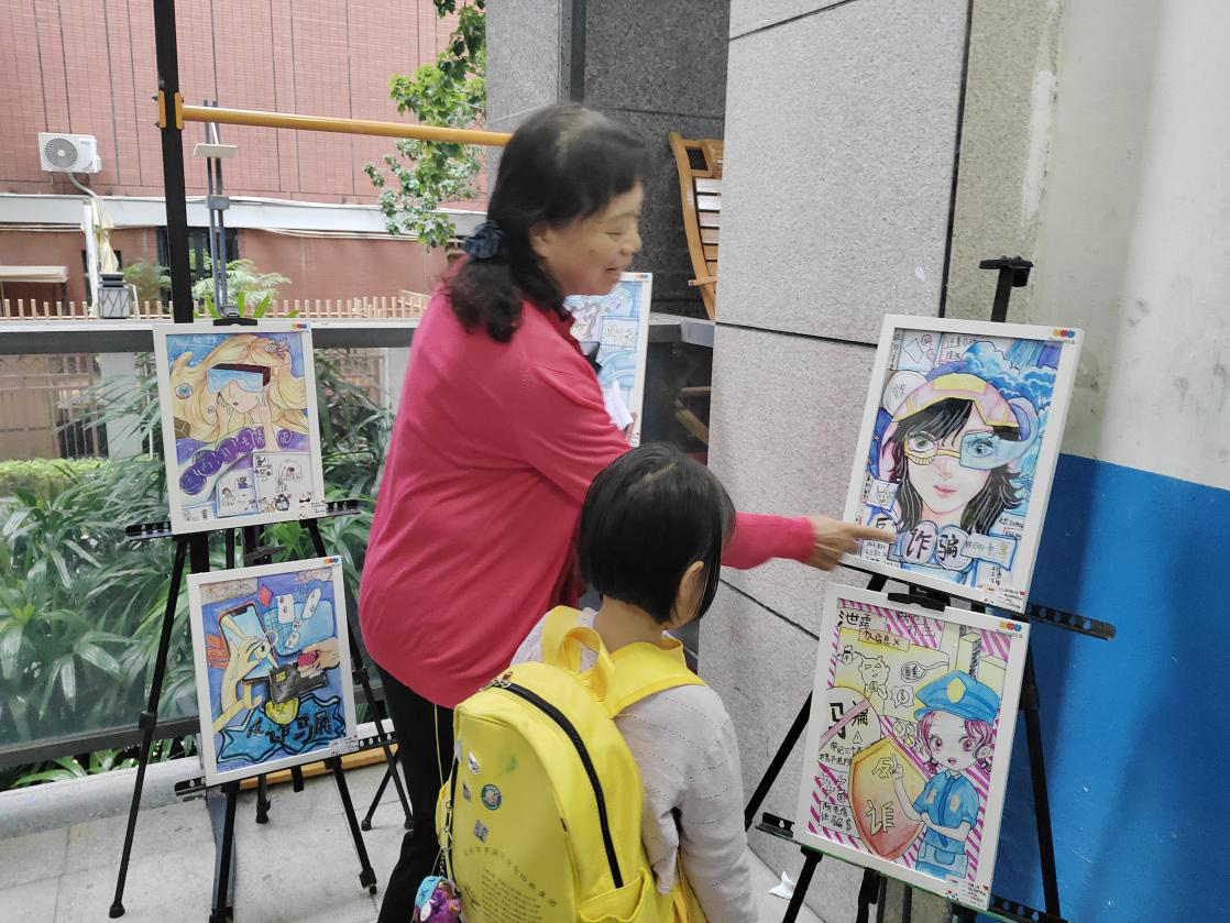 木头龙社区：创意反诈游园会趣味开讲，筑牢社区安全防线