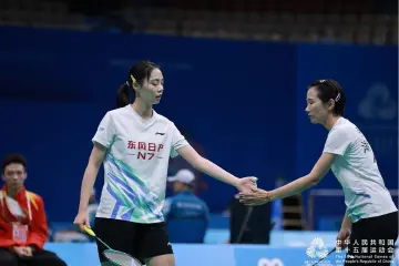 十五运群众羽毛球最年轻组选手:“第一次打这么大的场馆,震撼!”
