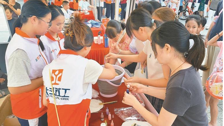 玉塘街道“志愿红”成为社区温暖底色