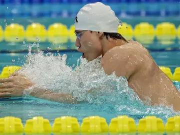 祝贺!覃海洋夺得十五运会男子100米蛙泳金牌