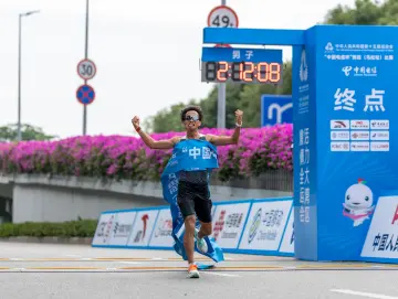 图集|全运会首个跨境马拉松 何杰获得男子冠军