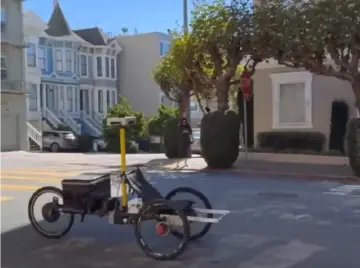 读特快评|“精灵单车”来了,骑手们不必焦虑:人机协作才是未来