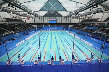 残运会赛场11日高潮迭起 双胞胎兄弟齐领奖“无臂飞鱼”获首金