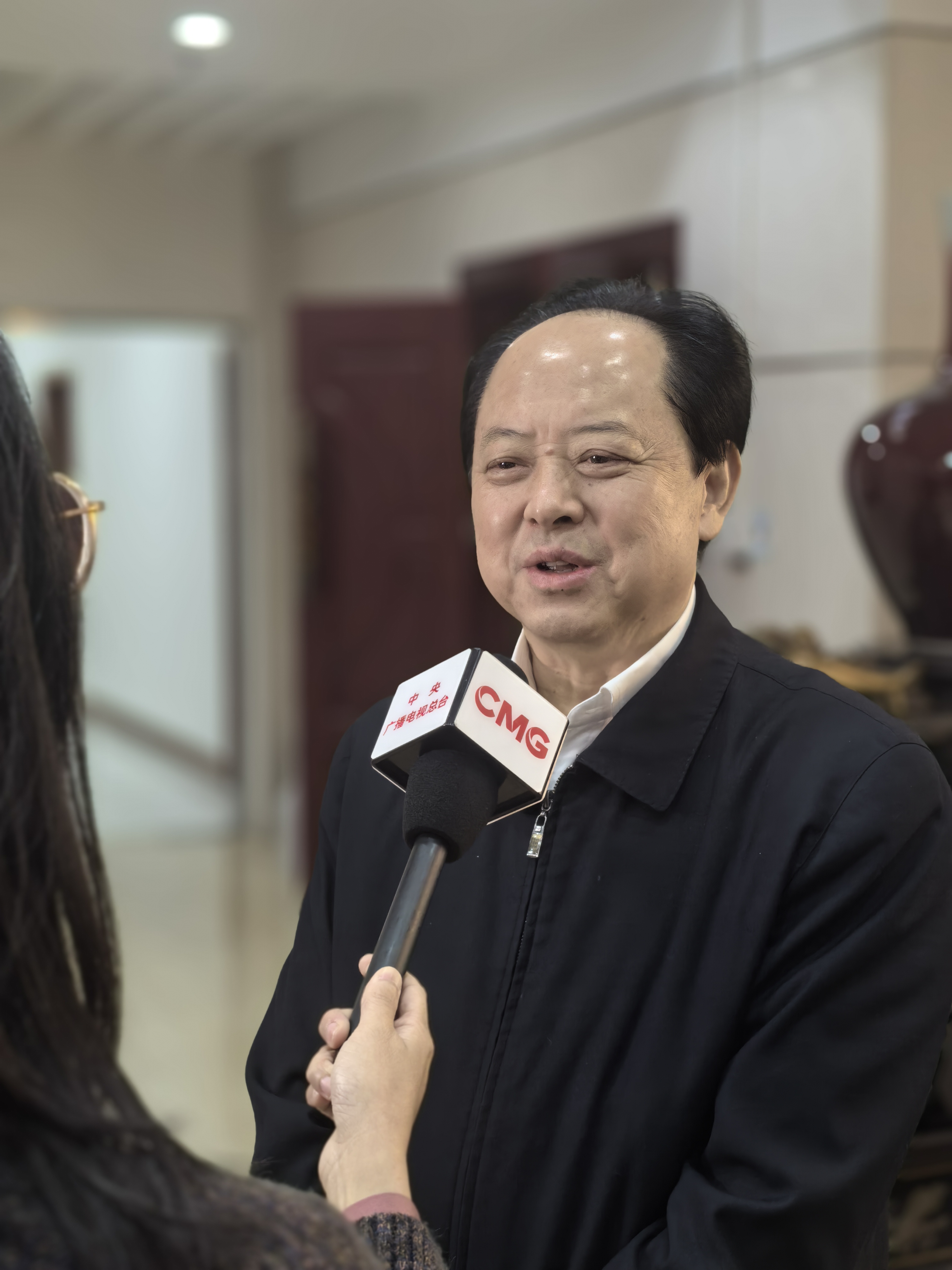 聚焦全国两会｜全国政协委员舒心：推动大湾区规则衔接与制度开放，将“深圳经验”推向全国