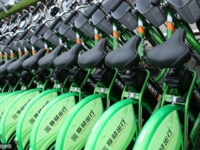 上海试点打造电动自行车“安全屋”：统一投币充电