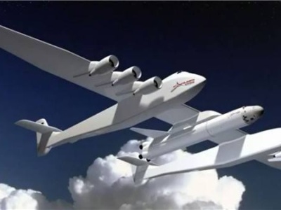世界最大双机身飞机首次亮相 可在空中发射火箭