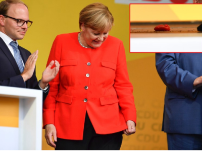 德国总理默克尔拉票时突遭“番茄袭击”