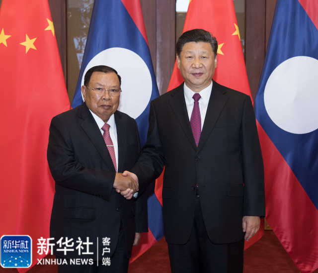 习近平同老挝人革党中央总书记、国家主席本扬举行会谈