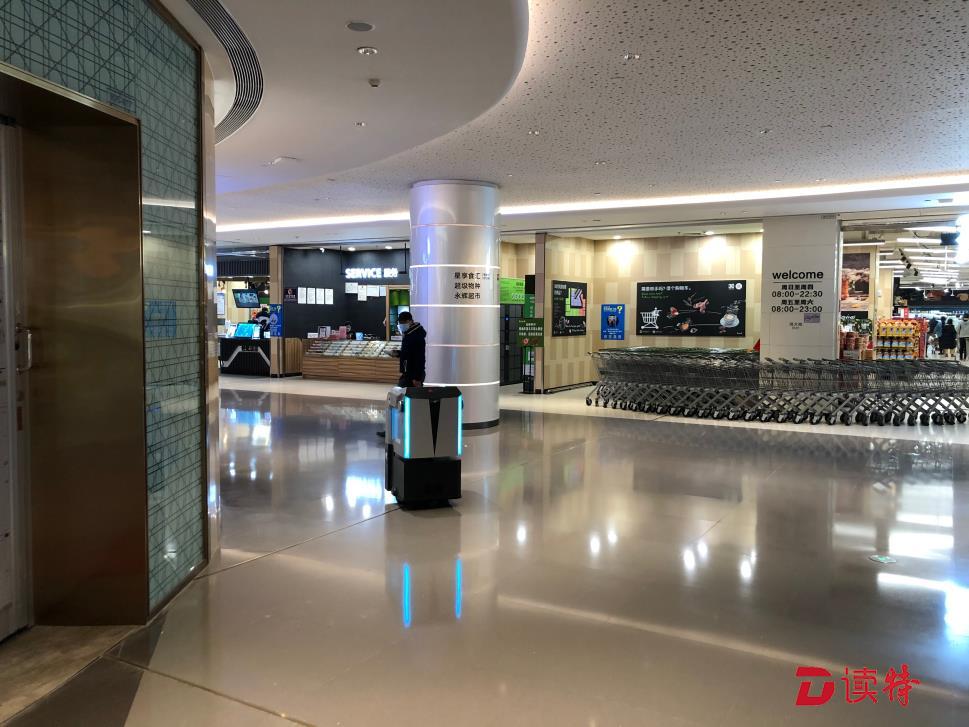 机器人负责“无接触配送”的“最后100米” 解决星河WORLD园区复工用餐难点