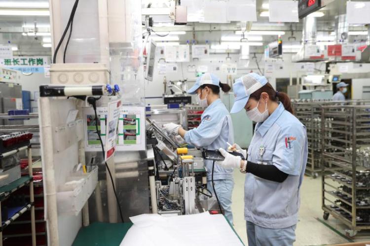 机器一响 市场不愁 近9成世界500强在黄埔复工