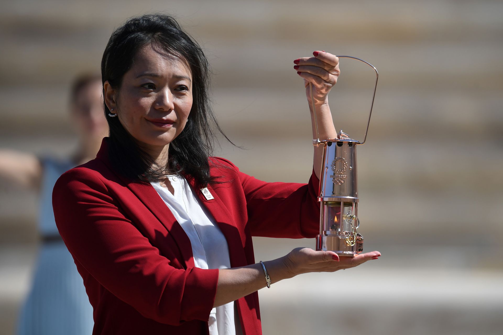 日本各方迎接奥运圣火抵达，再次承诺奥运会将如期举行