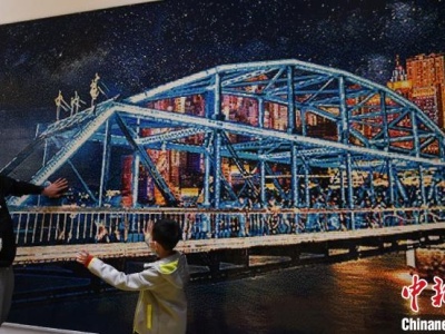 积木“魔法师”21万颗粒“铸”兰州黄河铁桥 再现丝路盛景