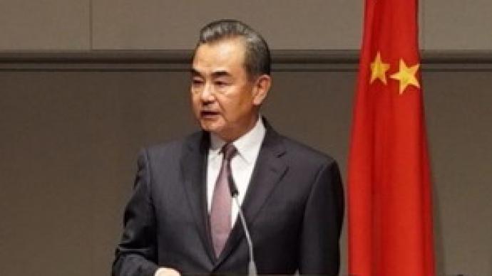 王毅：将应对疫情不力责任推卸给中方没有事实依据