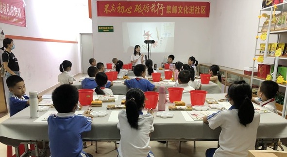 “传承文化 书画未来” 坪环社区开展青少年书画培训