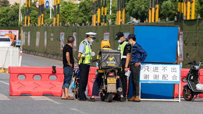 武汉封闭56个涉疫小区：只进不出，及时开展全员核酸检测